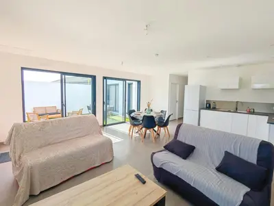 Coin salon dans l'établissement Maison cosy et spacieuse