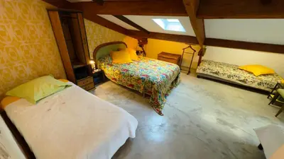 Un ou plusieurs lits dans un hébergement de l'établissement Le Moulin de Bel Air