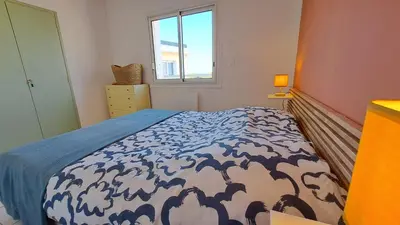 Un ou plusieurs lits dans un hébergement de l'établissement AIGUE MARINE - Appartement Vue Mer 1 chambre