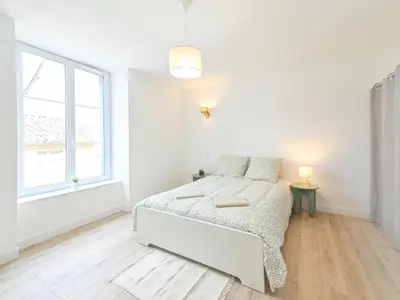 Un ou plusieurs lits dans un hébergement de l'établissement Le Recoin Serein, Charme et Modernité