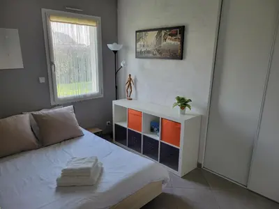 Un ou plusieurs lits dans un hébergement de l'établissement Maison cosy entre mer et Brière