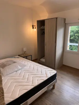 Un ou plusieurs lits dans un hébergement de l'établissement Appartement T3 - Plage à 500m