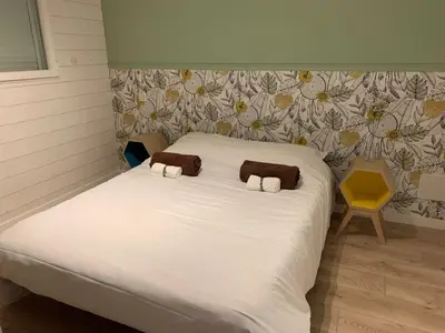 Un ou plusieurs lits dans un hébergement de l'établissement Gîte du marais 2