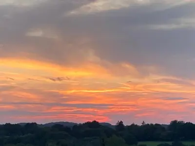 Lever ou coucher de soleil vu de la maison de vacances ou à proximité
