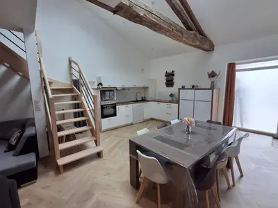 Cuisine ou kitchenette dans l'établissement Le Temps Suspendu