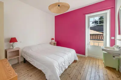 Un ou plusieurs lits dans un hébergement de l'établissement Proche du port & plages - Terrasse - Maison pour 5