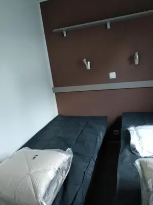 Coin salon dans l'établissement Mobil Home