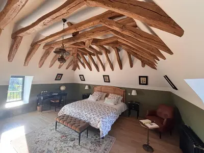 Un ou plusieurs lits dans un hébergement de l'établissement Le Domaine de la Haye Chambres d'Hôtes