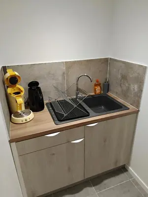 Cuisine ou kitchenette dans l'établissement Annexe du 18