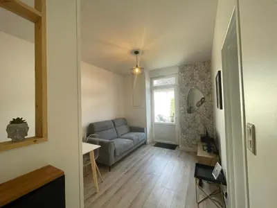 Coin salon dans l'établissement Charmant T2 avec cour extérieure