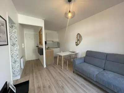 Coin salon dans l'établissement Charmant T2 avec cour extérieure