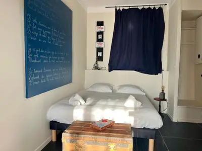 Un ou plusieurs lits dans un hébergement de l'établissement Exclusivité - La Maison à Vapeur