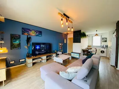 Télévision ou salle de divertissement dans l'établissement Casa Botanica