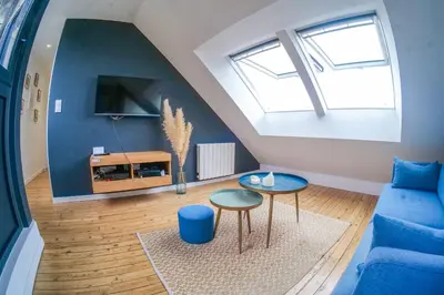Télévision ou salle de divertissement dans l'établissement Appartement très lumineux - vue sur la ville - 4 personnes