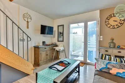 Télévision ou salle de divertissement dans l'établissement Maison Saint Surin 26