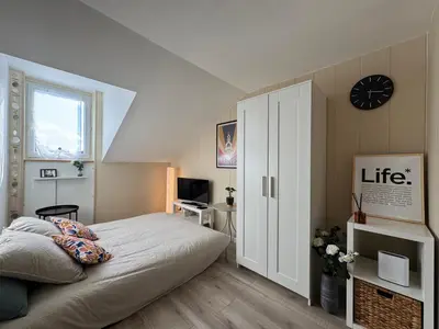 Un ou plusieurs lits dans un hébergement de l'établissement L'Échappée - Wi-Fi, TV, Ultra Central, Cozy