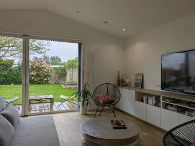 Télévision ou salle de divertissement dans l'établissement Agréable dépendance !