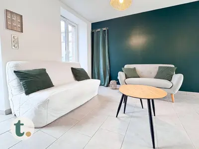 Coin salon dans l'établissement Tranquiloue - Maison Familiale - 15min Puy du Fou