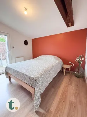 Un ou plusieurs lits dans un hébergement de l'établissement Tranquiloue - Maison Familiale - 15min Puy du Fou