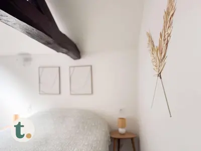 Un ou plusieurs lits dans un hébergement de l'établissement Tranquiloue - Petit Appartement - 10min Puy du Fou