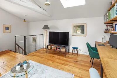 Télévision ou salle de divertissement dans l'établissement La Petite Fouques - Confortable et paisible