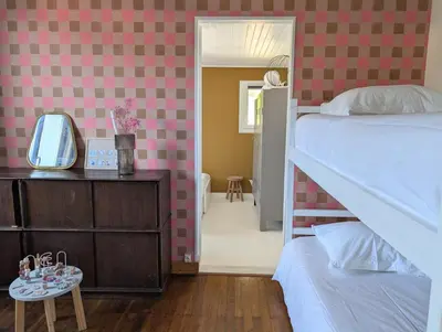 Un ou plusieurs lits dans un hébergement de l'établissement Esprit vacances entre jardin & plage du Porteau