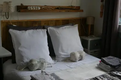 Un ou plusieurs lits dans un hébergement de l'établissement Chambre d'hôtes