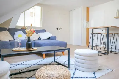 Coin salon dans l'établissement Très bel appartement lumineux et au calme - 2 personnes