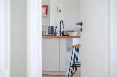 Cuisine ou kitchenette dans l'établissement Très bel appartement lumineux et au calme - 2 personnes