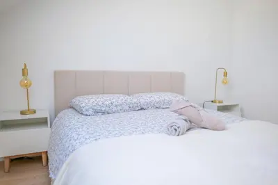 Un ou plusieurs lits dans un hébergement de l'établissement Très bel appartement lumineux et au calme - 2 personnes