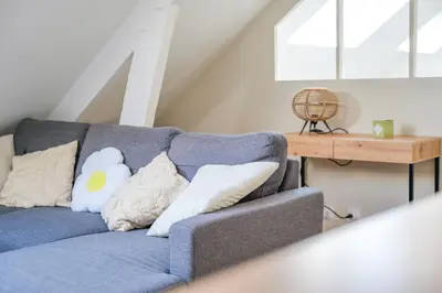 Coin salon dans l'établissement Très bel appartement lumineux et au calme - 2 personnes