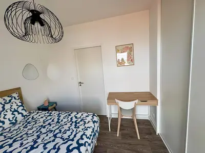 Un ou plusieurs lits dans un hébergement de l'établissement Nid Urbain - 3 Ch et Terrasse
