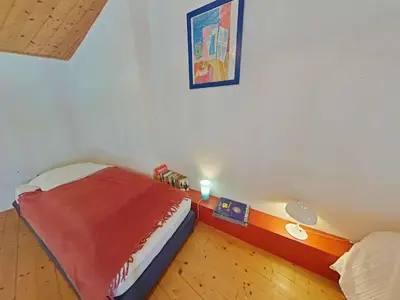 Un ou plusieurs lits dans un hébergement de l'établissement Studio Mezzanine Confortable à 200m de la Plage - FR-1-224B-245