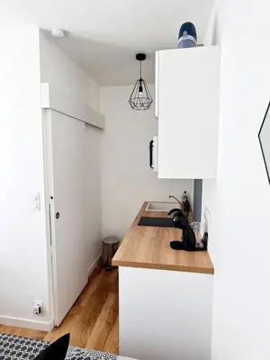 Cuisine ou kitchenette dans l'établissement Studio 1 Cozy en centre-ville - Puy duFou