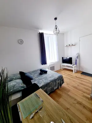 Un ou plusieurs lits dans un hébergement de l'établissement Studio 2 Cosy en centre-ville - Puy duFou