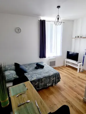 Un ou plusieurs lits dans un hébergement de l'établissement Studio 2 Cosy en centre-ville - Puy duFou