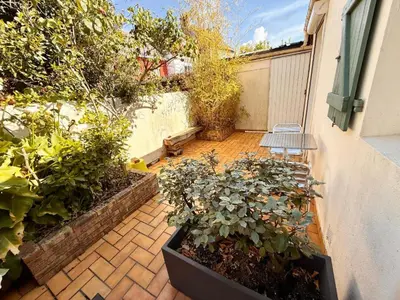 Jardin de l'établissement L'harmattan Studio T1 PREMIUM dans résidence Privée avec Patio à proximité