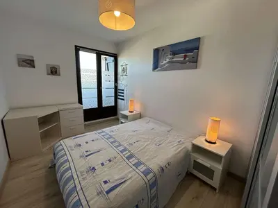 Un ou plusieurs lits dans un hébergement de l'établissement Appartement moderne 3 pièces, vue mer, parking privé, 5 couchages - FR-1-224C-348