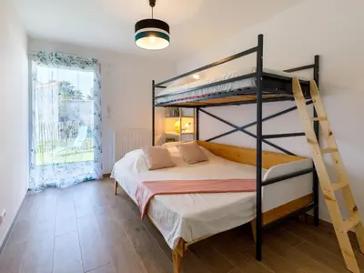Un ou plusieurs lits dans un hébergement de l'établissement Apartment Océanide-1 by Interhome