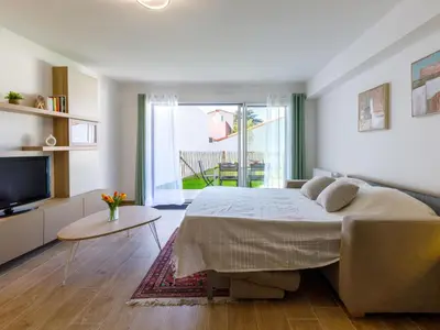 Un ou plusieurs lits dans un hébergement de l'établissement Apartment Océanide-1 by Interhome