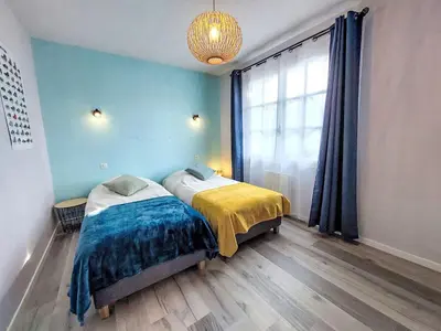Un ou plusieurs lits dans un hébergement de l'établissement Holiday Home Proche Océan- forêt et commerces by Interhome