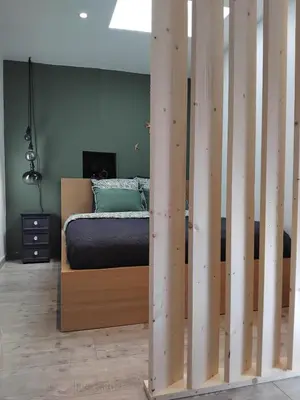 Un ou plusieurs lits dans un hébergement de l'établissement Maison La Bulle d'Héloïse