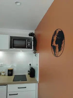 Cuisine ou kitchenette dans l'établissement Maison La Bulle d'Héloïse
