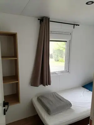 Un ou plusieurs lits dans un hébergement de l'établissement Mobil-home bord de plage à Saint-Hilaire-de-Riez
