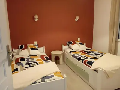 Un ou plusieurs lits dans un hébergement de l'établissement Maison Familiale 6 pers - Orouët