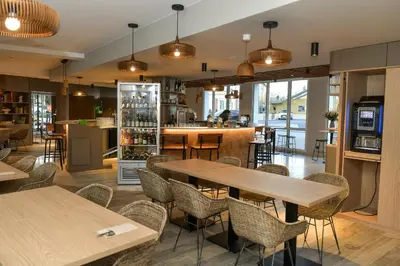 Restaurant ou autre lieu de restauration dans l'établissement Hotel Rivella - The Originals Boutique