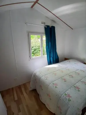 Un ou plusieurs lits dans un hébergement de l'établissement Mobil-home confort 2 chambres à La Baule
