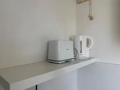 Plateau bouilloire dans l'établissement Bienvenue dans la jungle - Proche Parc et Commodités & Wifi