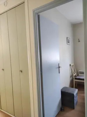 Un ou plusieurs lits dans un hébergement de l'établissement Appartement T2 450m de la plage des demoiselles, avec garage et possibilité de vélos à 950m de la rue piétonne