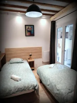 Un ou plusieurs lits dans un hébergement de l'établissement Le Moulin Neuf, logements atypiques dans le Pays d'Ancenis